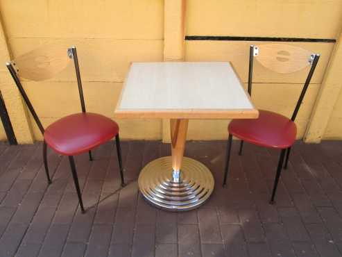 Retro look tables and chairs for sale.