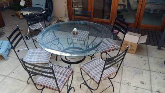 Round glass dining table with 6 matching chairs for only r3500 CALL NOW