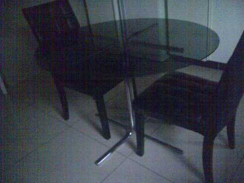 Round tinted glass table and 4 x chairs