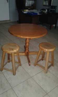 Round wooden table for sale with 2 stools