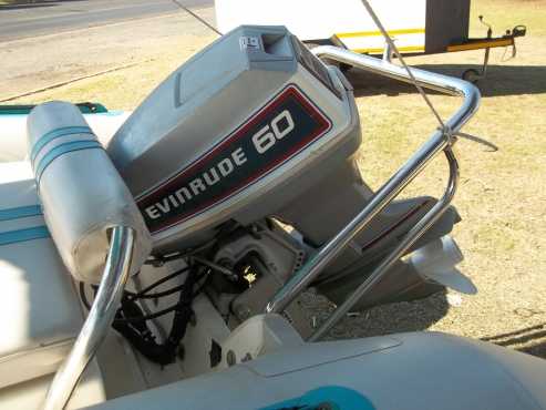 Rubber Duck Boat, 60hp Evinrude motor,trailor