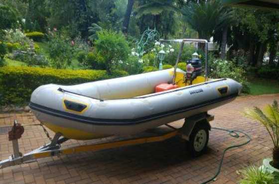 Rubber duck with fiberglass whole, trailer and 20 HP moter