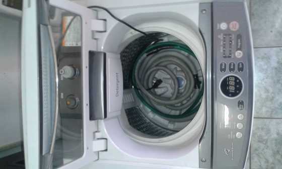 Samsung diamond drum top loader 13Kg washing machine.