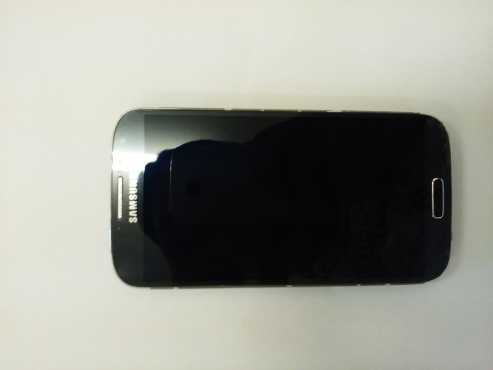 Samsung Galaxy S4 with charger.