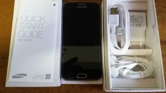 Samsung galaxy S6 32 gig with wireless charger With box and all accessories NO scratches Earphones s