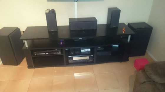 sansui components sound and a TV stand