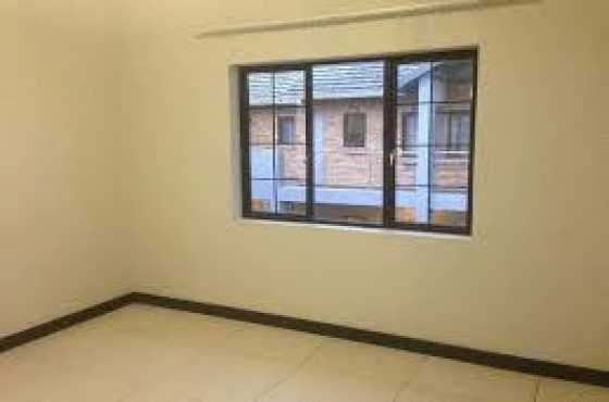 Scarlet Park Rooihuiskraal Rd Ground floor unit with own patio area