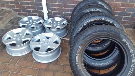 Set original Jeep 17 inch Mags with 2456517 Khumo All Terrain Tyres with 7.01mm tread left