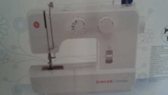 Singer Sewing Machine for sale - never been used and in original packaging