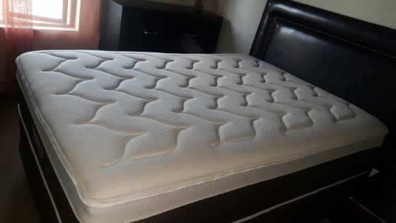 Sleepmaster dual comfort double bed for sale