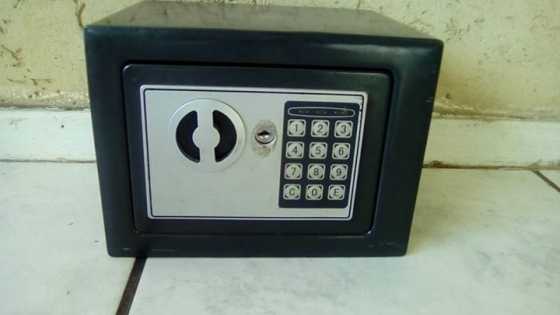 Small battery and key operated safe