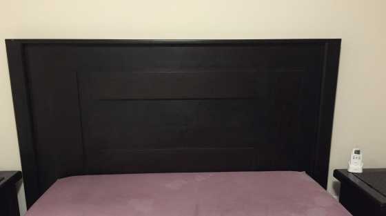 Solid dark wood headboard