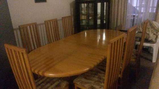 Solid Oak Dining room set with 8 newly upholstered chairs, can collapse to 6 seater