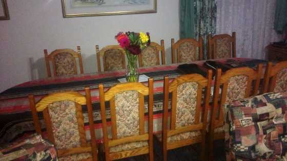 Solid Oak diningroom table and 12 chairs