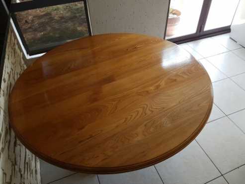 Solid oakwood dinning room table for sale.