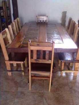 Solid sleeper wood dining room suite with slate tiles, 8 chairs