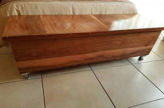 Solid teak bed end case.