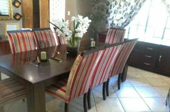 Solid wooden 8 seater dinning room set.