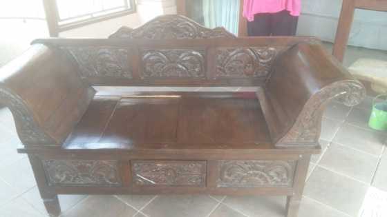 Solid wooden, hand carved bench.Good condition.