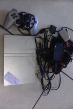 Sony playstation 2. includes 8 playstation games