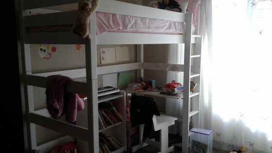 Space saver bunk bed with built in desk, chair and bookshelf