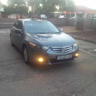 Special Honda Accord 2009 auto in excellent condition for R90,000.00  This is a very nice car for c