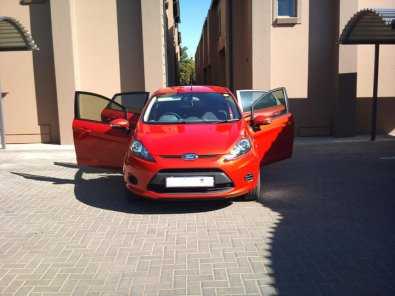 Sporty Chilli orange Ford Fiesta 2011 for sale.