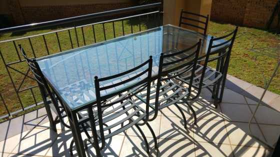 STEEL DINING TABLE .6 SEATER THICK GLASS TOP SUPER CONDITION