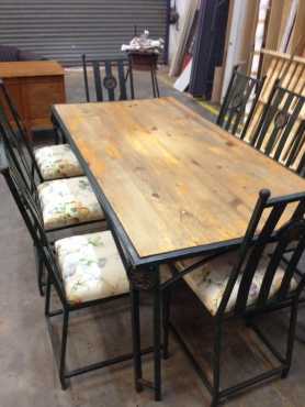 Steel dining table with 8 chairs  free matching mirror. URGENT