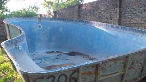 Swimming Pool with pump and paving