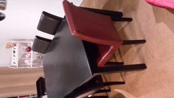 Table and leather chairs