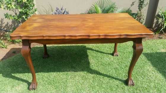 Teak ball and claw dining table