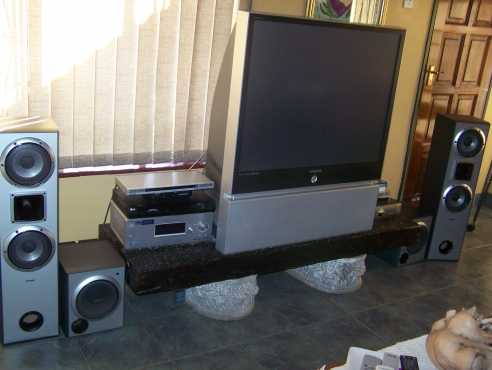 Television 110 x 110cm amp Surround sound, and TV stand