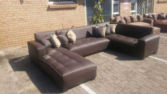 The Texas UShape Lounge Set Comes with 8 Cushions and a Free Ottoman Size 3.2m x 2m x 2m