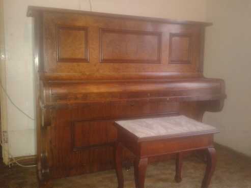 This Piano selling price is R 10 000 neg.