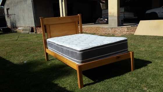 Three quarter wooden bed with mattress