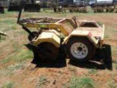 Tow behind road construction broom