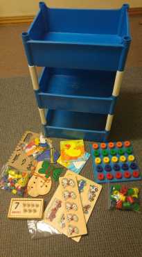 Toy stacker including content of educational toys