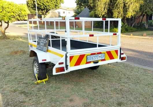 Trailer with detachable gate