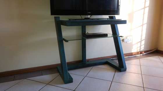 TV Stand . Extremely strong Steel Stand with thick glass.