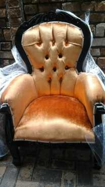 Two button back chairs in old gold velvet.