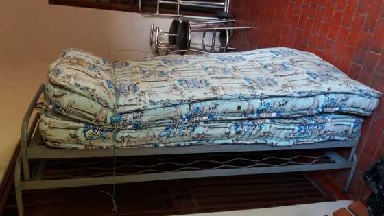 Two single steel beds with matrasses