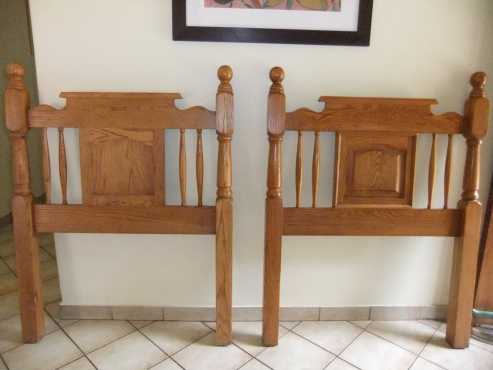 Two solid oak single headboards for sale