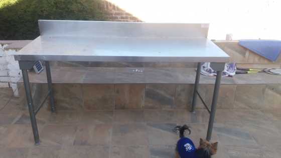 Two stainless steel tables. 1500 each