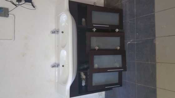 Vanities, basins, taps, mirrors, baths and glass shower doors for sale