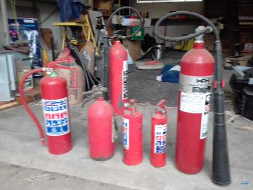 various sizes empty fire extinguishers