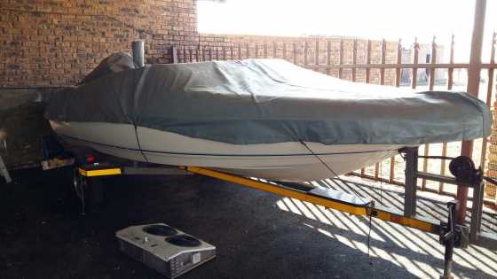 Velocity Boat with Marin115 engin and Runabout boat trailer for sale.