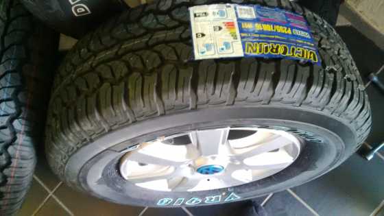 VW 16 amarok mags original with new 2557016 all terrain tyres