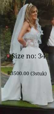 Wedding dresses and flower girl dresses for sale on negotiated lower prises or to swap for same valu