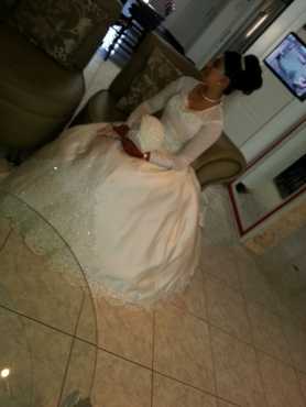 wedding gown, veil as well as trail for sale